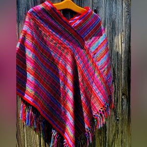 Stunning Guatemalan poncho in red & blue. Never worn. One size. Wear with jeans!